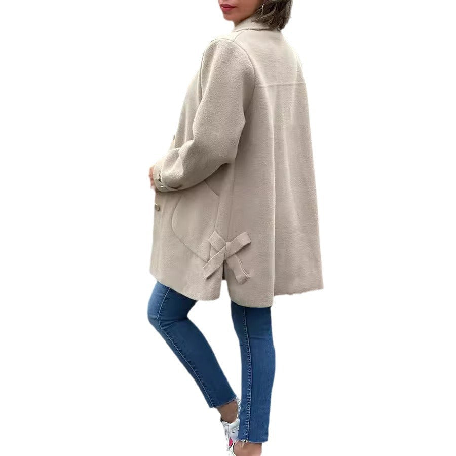 MOANA | Klassisk oversize frakke med detaljer i form af sløjfer